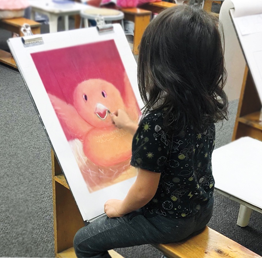 Child Student Working on Pastel Drawing Child Student Working on a Pastel Drawing